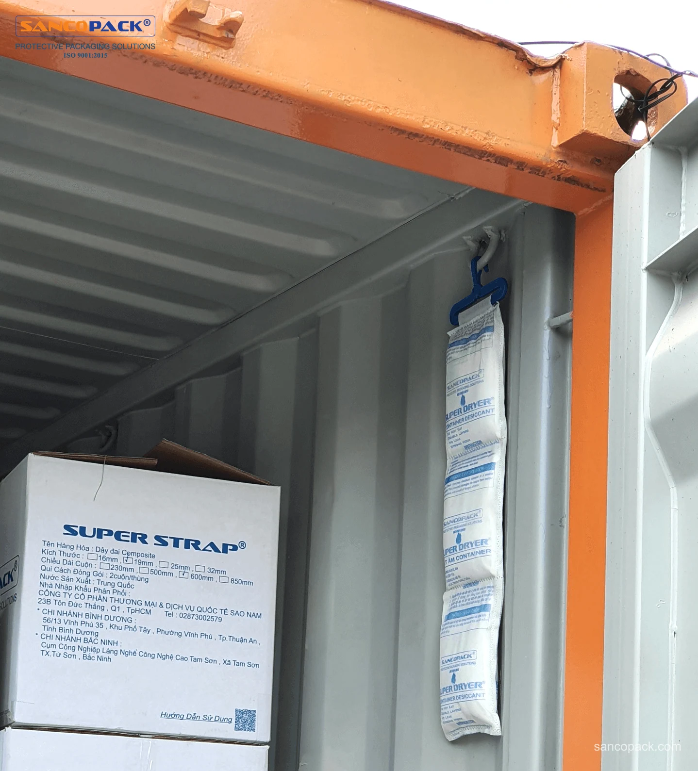 Super Dryer desiccant strip hanging near a container door